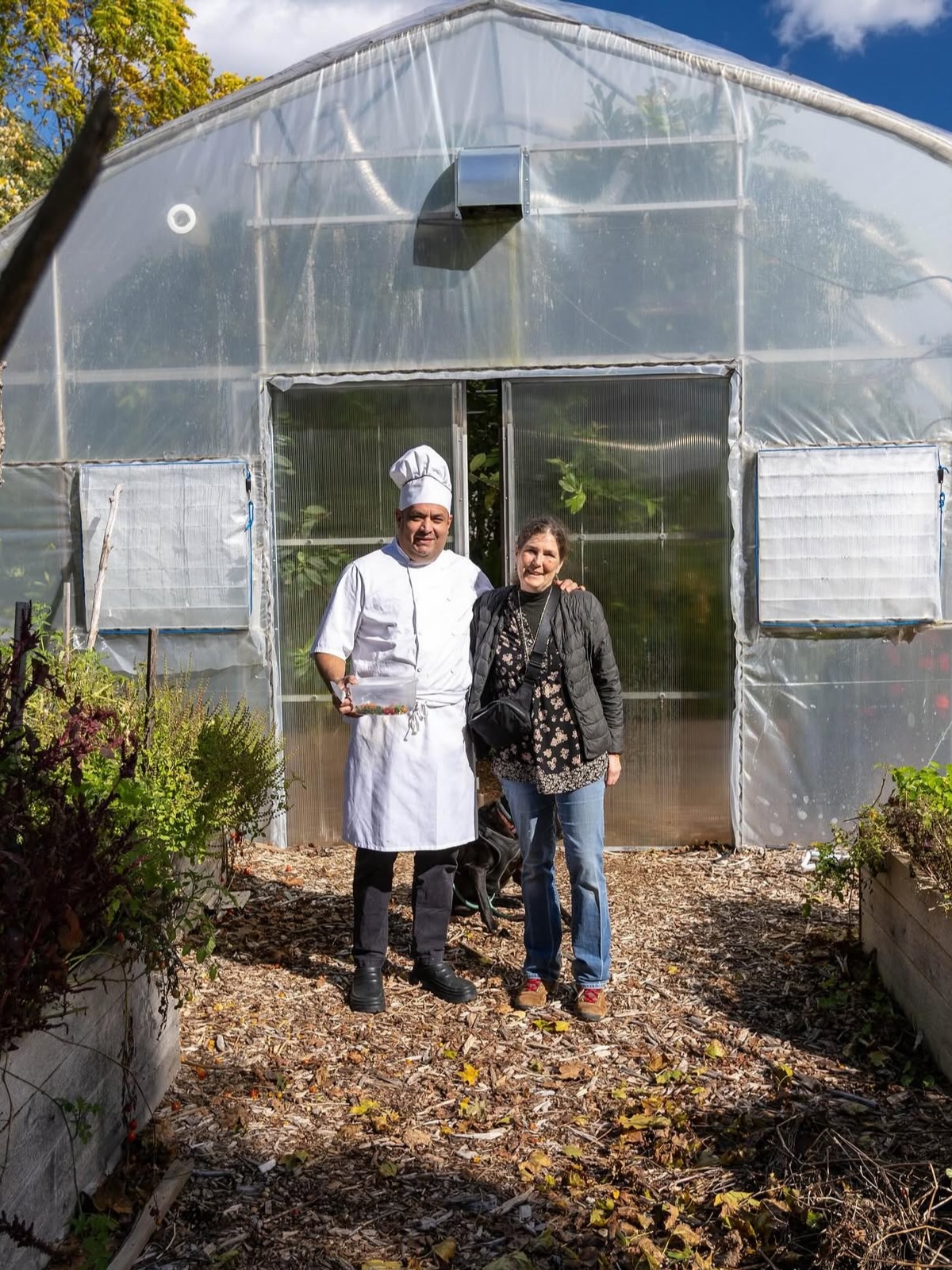 Chef Carlos Asseph next to Lisa.